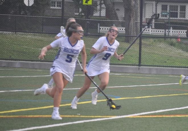 Megan Krestinski 5 and Caroline Ircha 9 in the quarterfinals on Monday